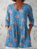 Melania - Blusa larga con cuello en V