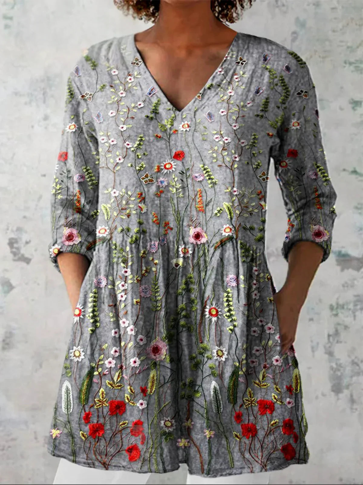 Túnica mujer con estampado gráfico y escote en V