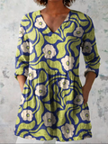 Elidia - Blusa larga con cuello en V