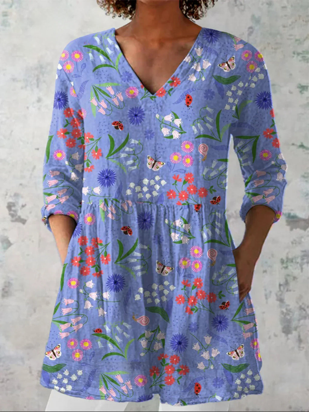 Túnica mujer con estampado gráfico y escote en V