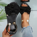 Sandalias mujer planas con lazo decorativo y detalles de perlas