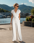 Mono mujer con escote en V cinturón y pantalón ancho casual chic