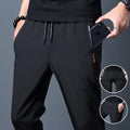 Pantalón casual hombre slim con cintura elástica y bolsillos con cremallera