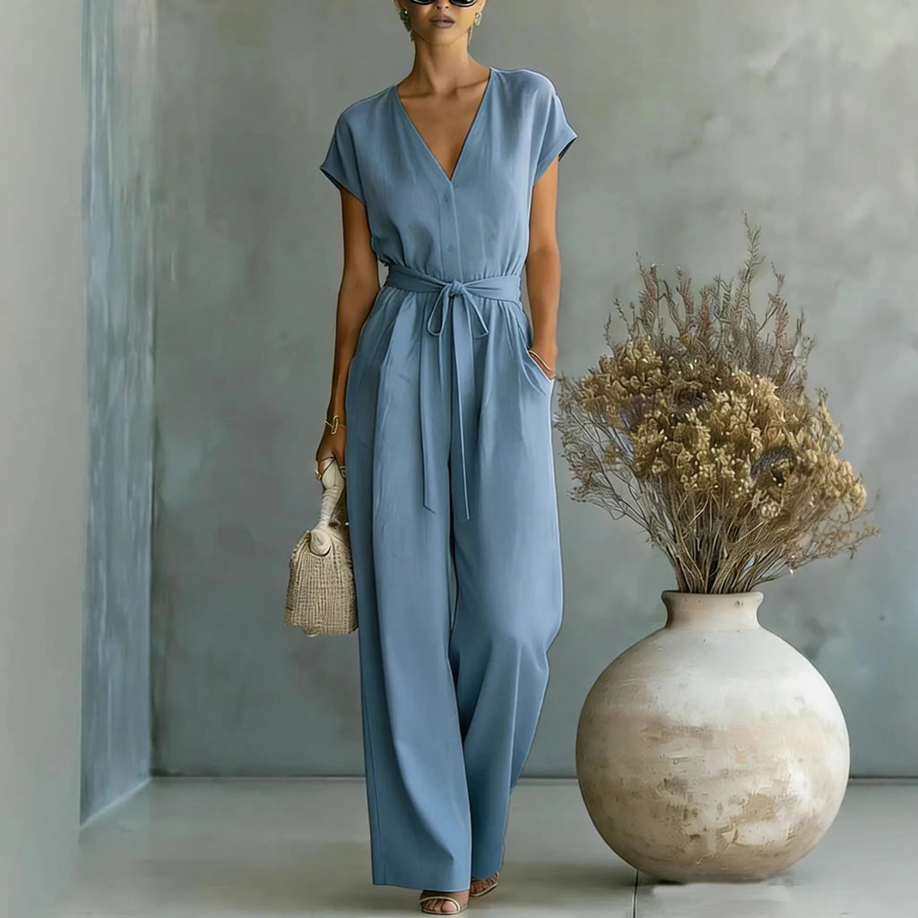 Mono mujer con escote en V cinturón y pantalón ancho casual chic