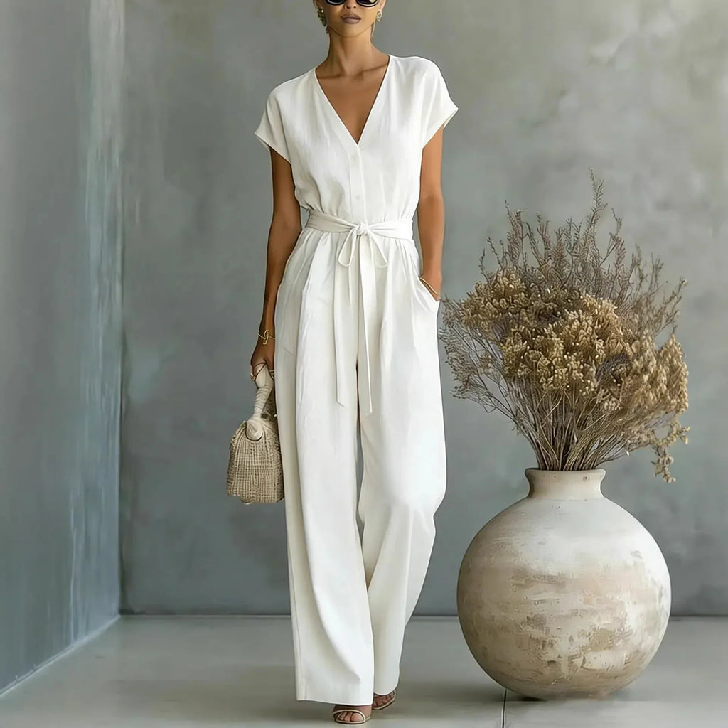Mono mujer con escote en V cinturón y pantalón ancho casual chic