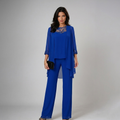 Conjunto mujer elegante de tres piezas con pantalón fluido