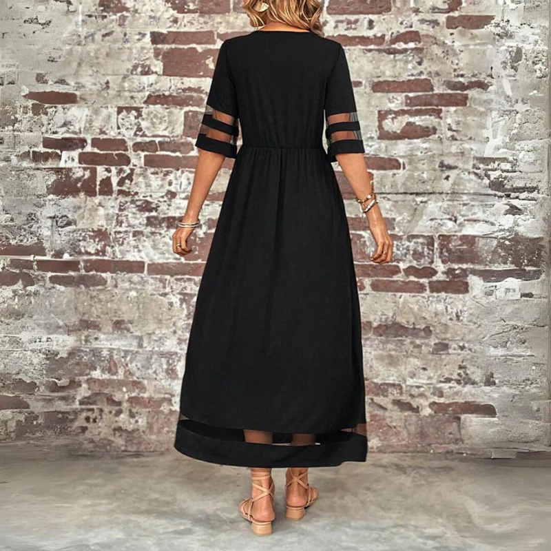 Vestido largo femenino de tejido ligero con detalles transparentes