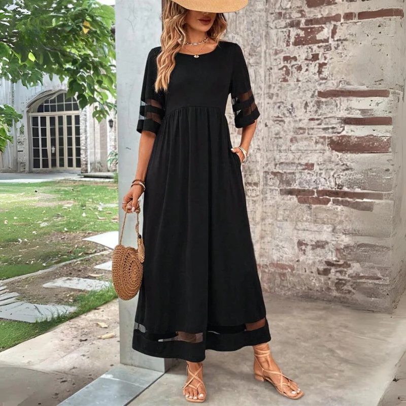 Vestido largo femenino de tejido ligero con detalles transparentes