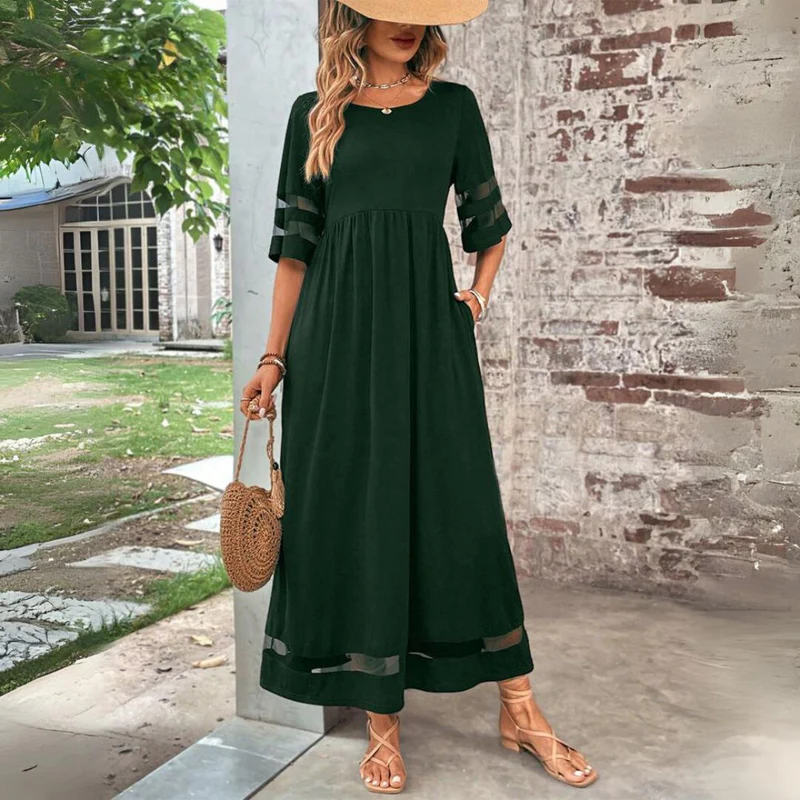 Vestido largo femenino de tejido ligero con detalles transparentes
