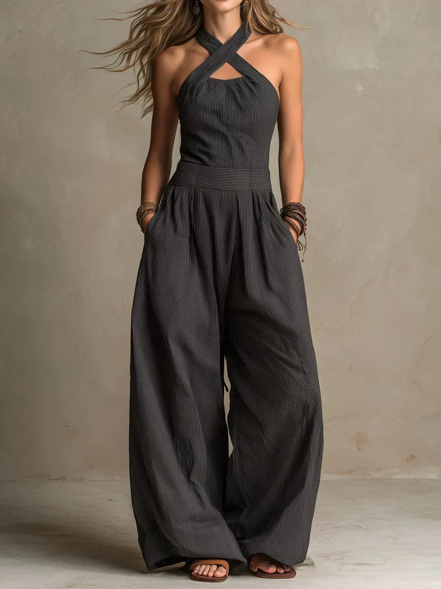 Mono mujer elegante con piernas anchas y diseño cruzado