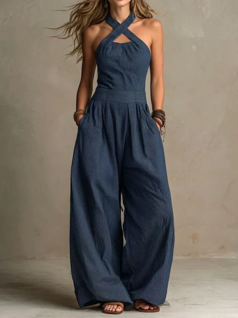 Mono mujer elegante con piernas anchas y diseño cruzado
