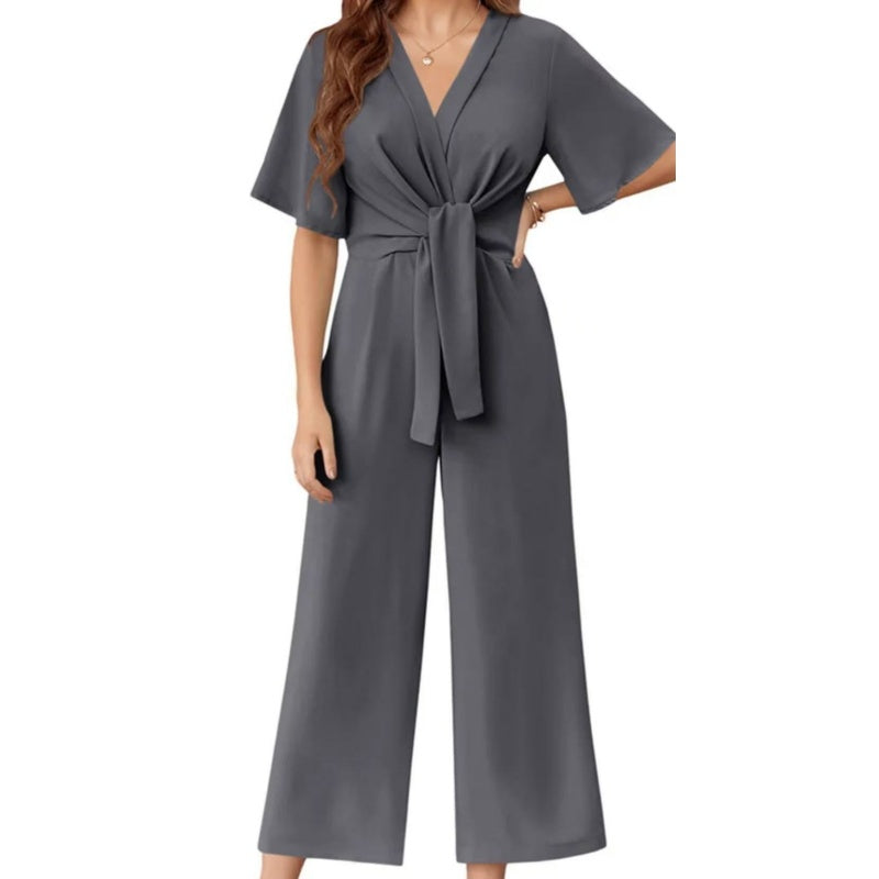 Mono mujer elegante con escote cruzado y pantalón de pierna ancha