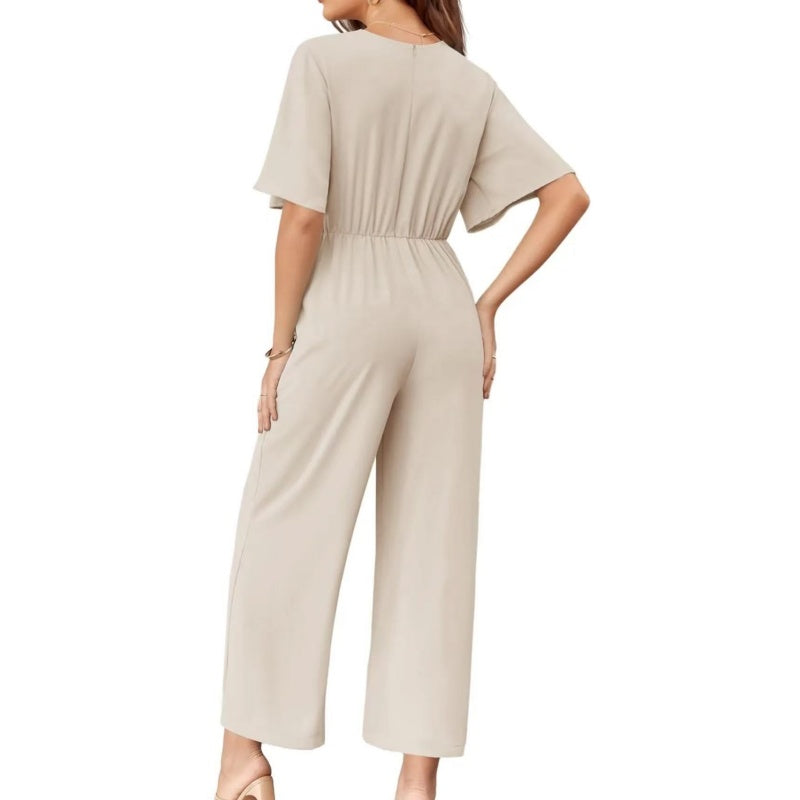 Mono mujer elegante con escote cruzado y pantalón de pierna ancha