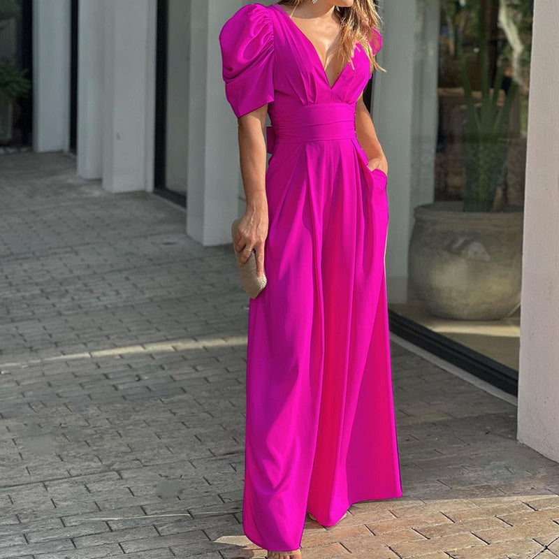 Mono elegante de mujer con escote en V y pantalón palazzo