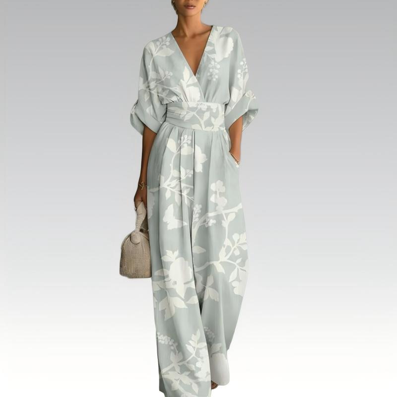 Mono mujer floral con cintura marcada y escote en V verano