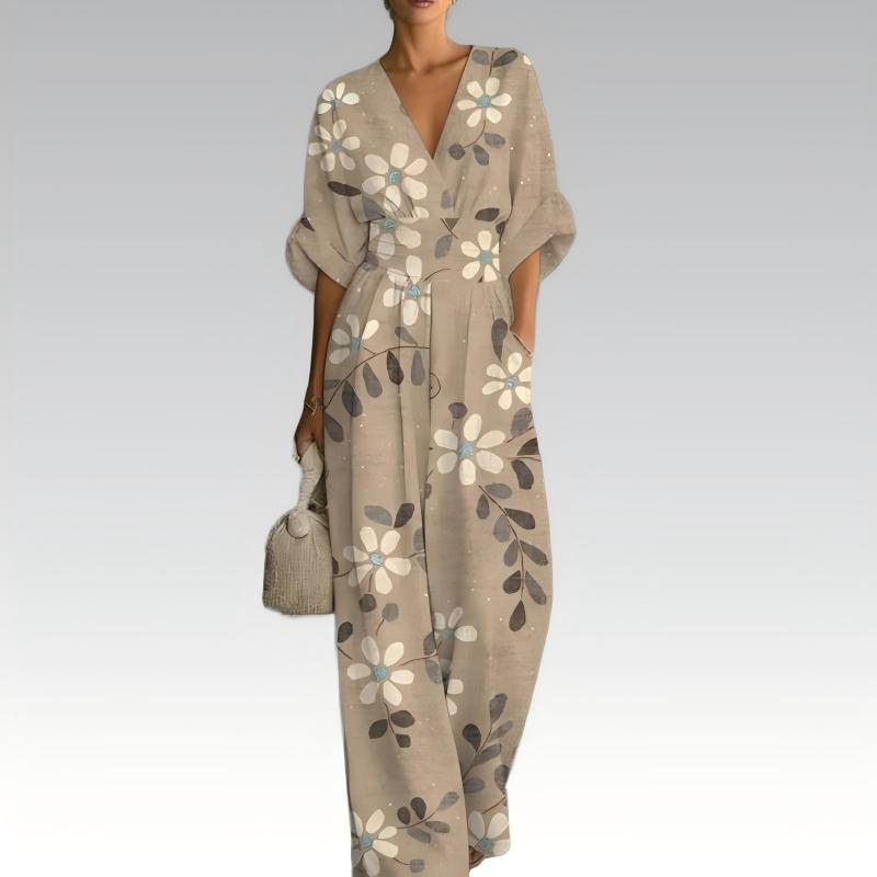 Mono mujer floral con cintura marcada y escote en V verano