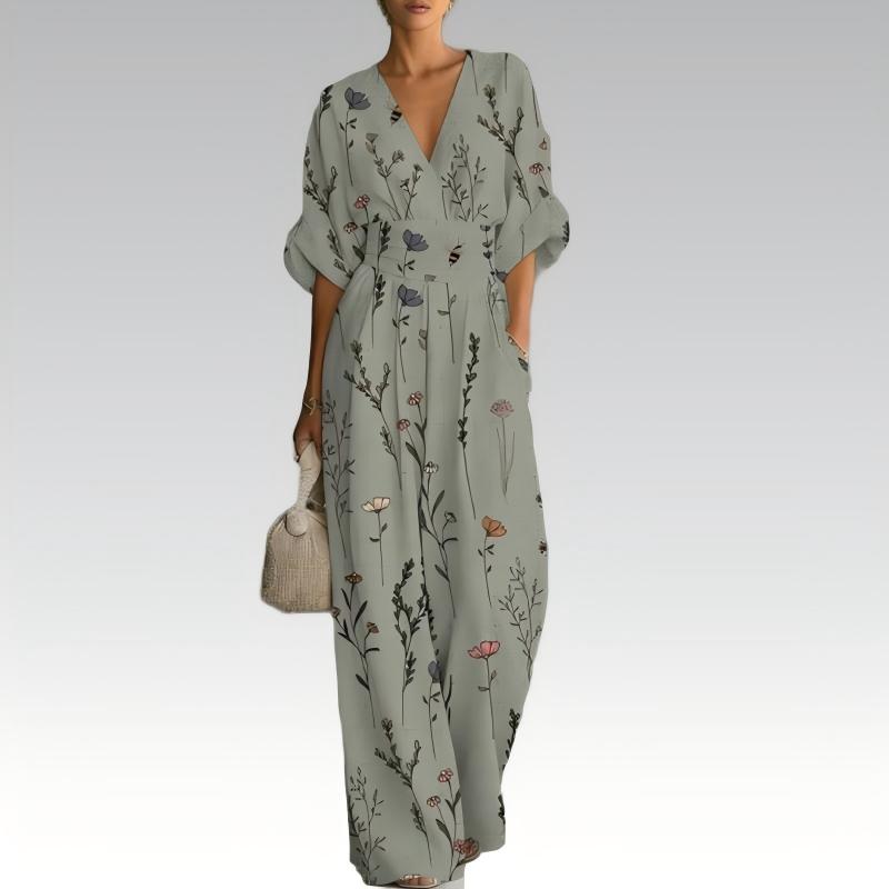 Mono mujer floral con cintura marcada y escote en V verano