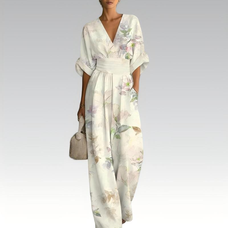 Mono mujer floral con cintura marcada y escote en V verano