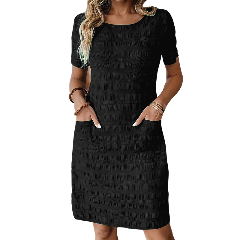 Vestido mujer texturizado con cuello redondo y bolsillos
