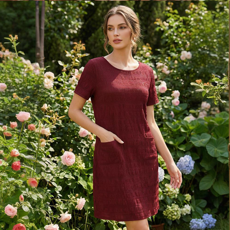 Vestido mujer texturizado con cuello redondo y bolsillos