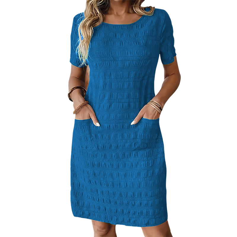 Vestido mujer texturizado con cuello redondo y bolsillos