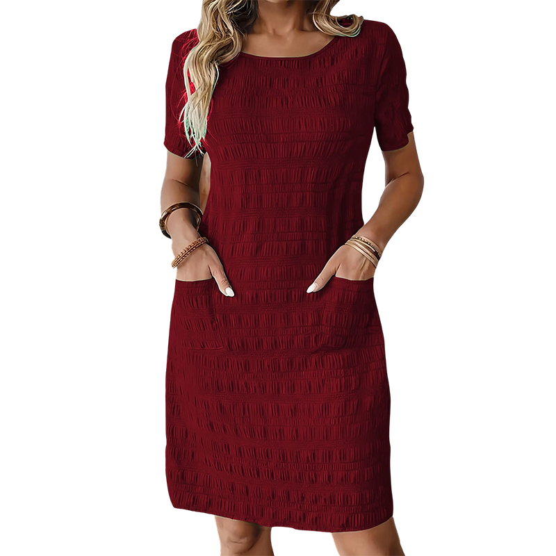 Vestido mujer texturizado con cuello redondo y bolsillos